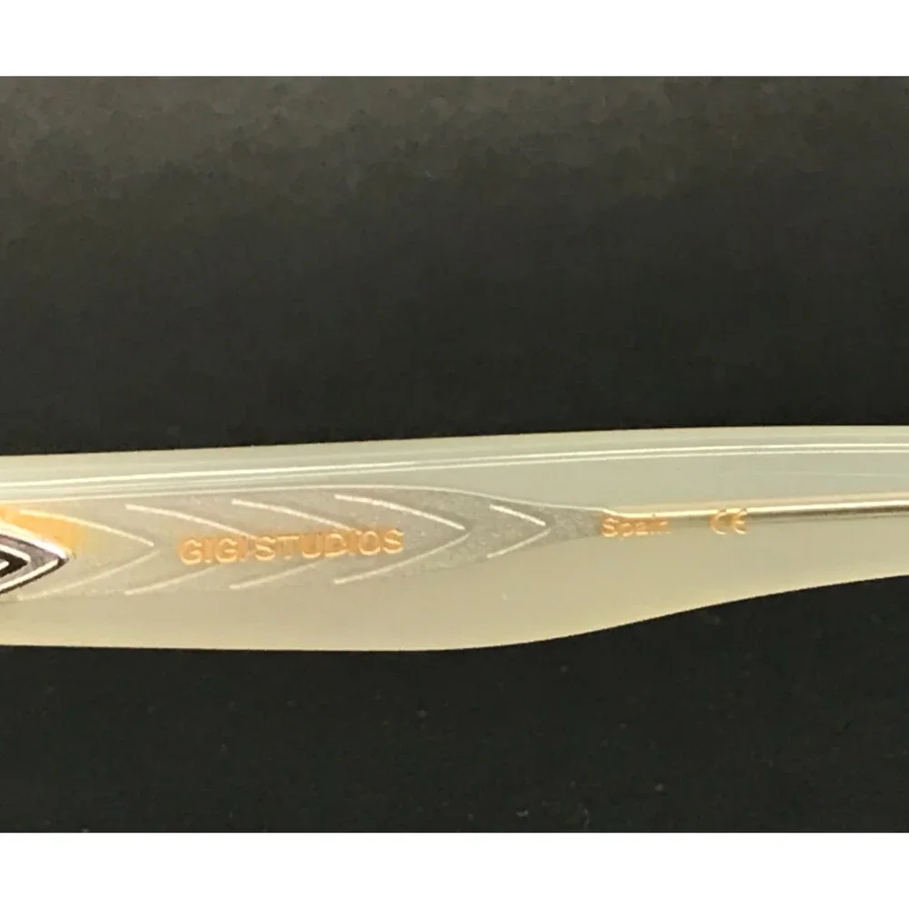 Gigi Studios Eyeglasses Frames GS1027/25O THRIVE 006 Ivory Clear Fade 53-14-140